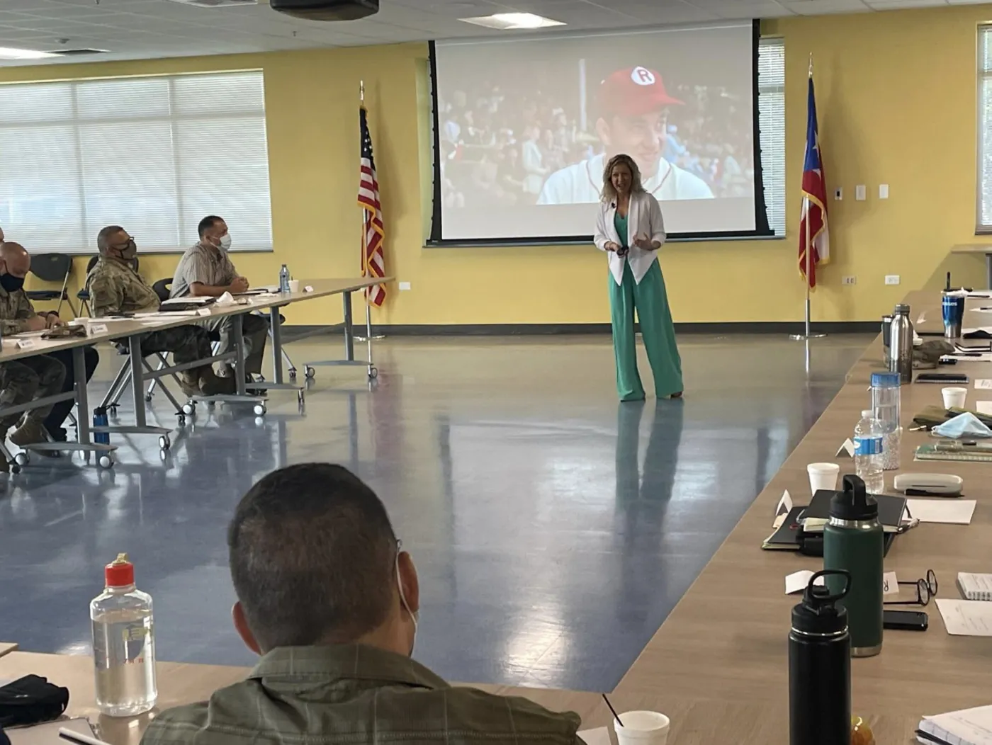 Krystalore Crews teaching a leadership session to a room of service members