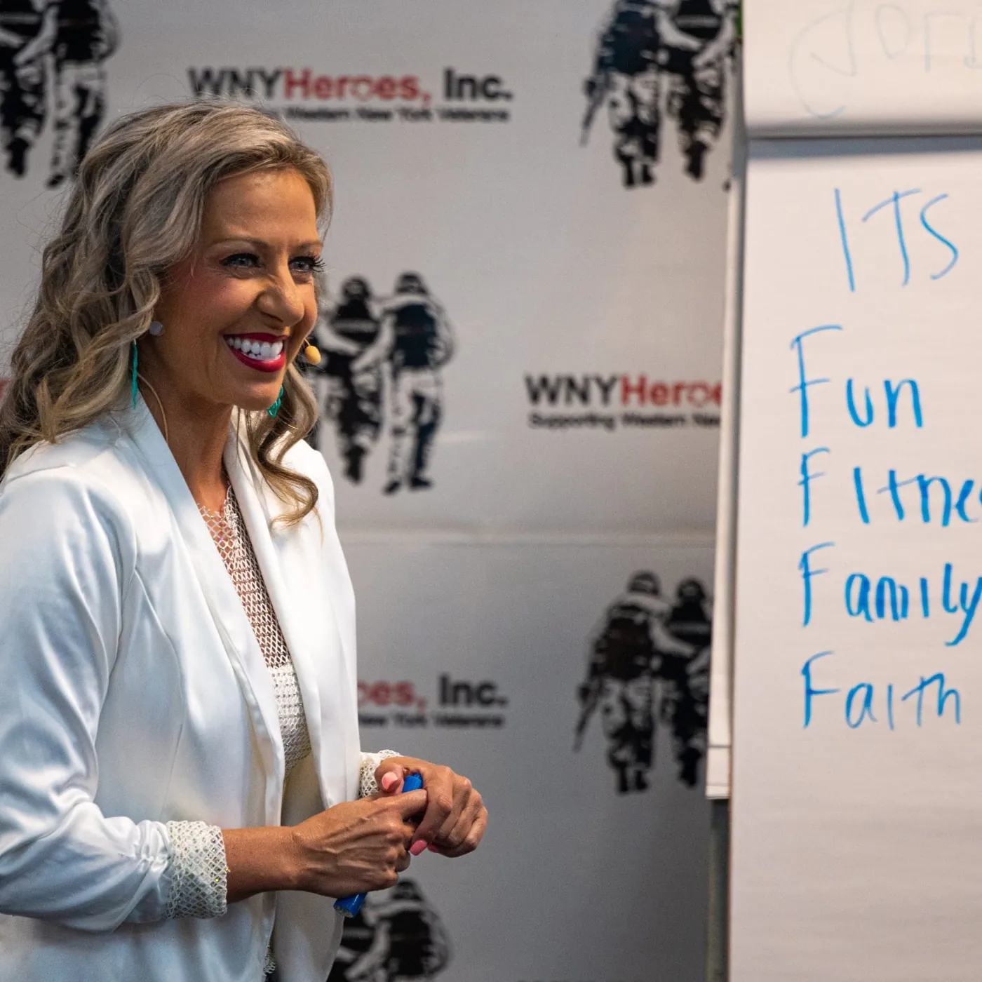 Krystalore Crews speaking at a veterans organization event